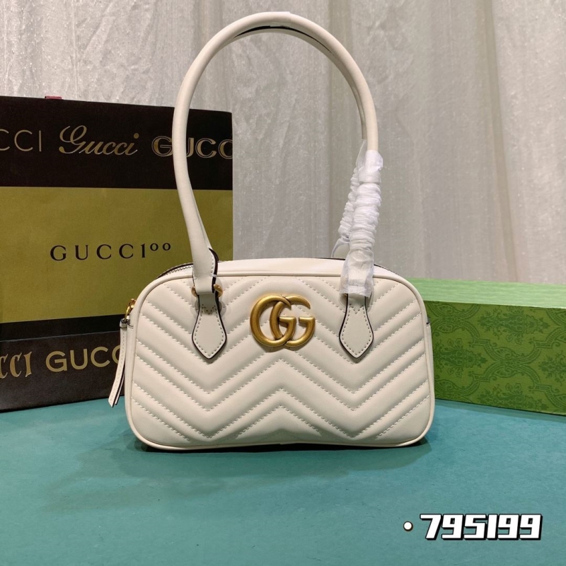 G*u*i top handle bags